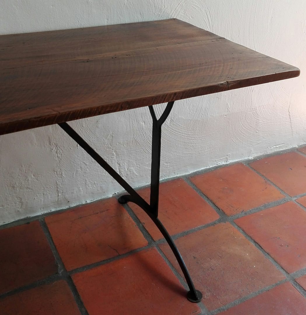 Four seater table made from 19th century reclaimed yellowwood on metal base