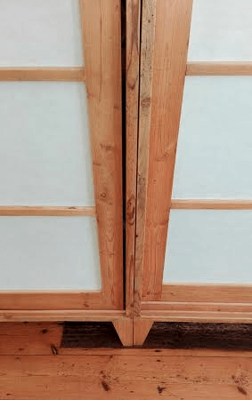 Cupboard with sliding doors created from reclaimed 19th century Oregon pine